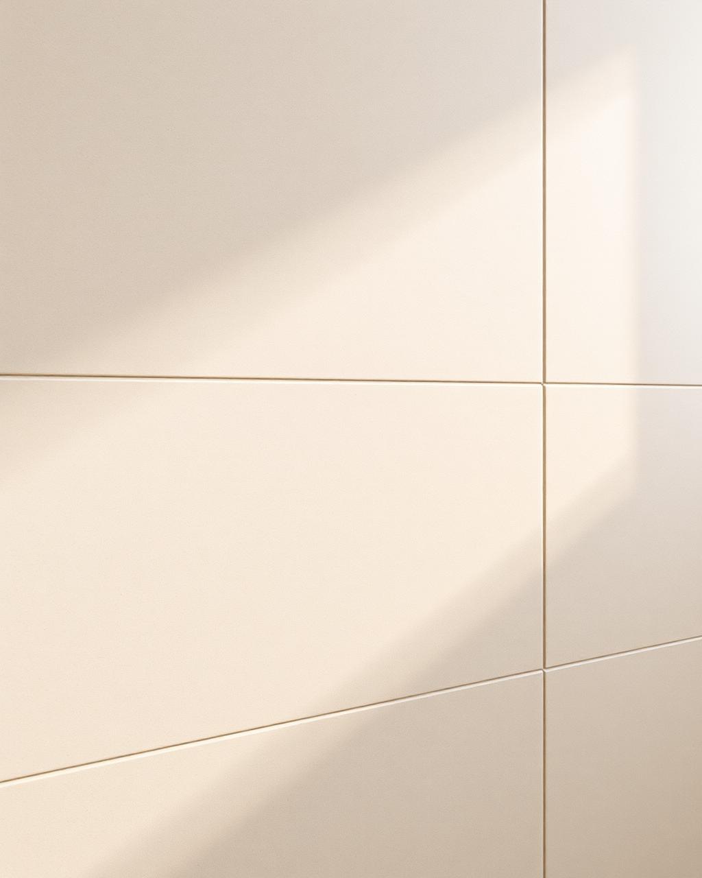 Beige large-format bathroom tiling